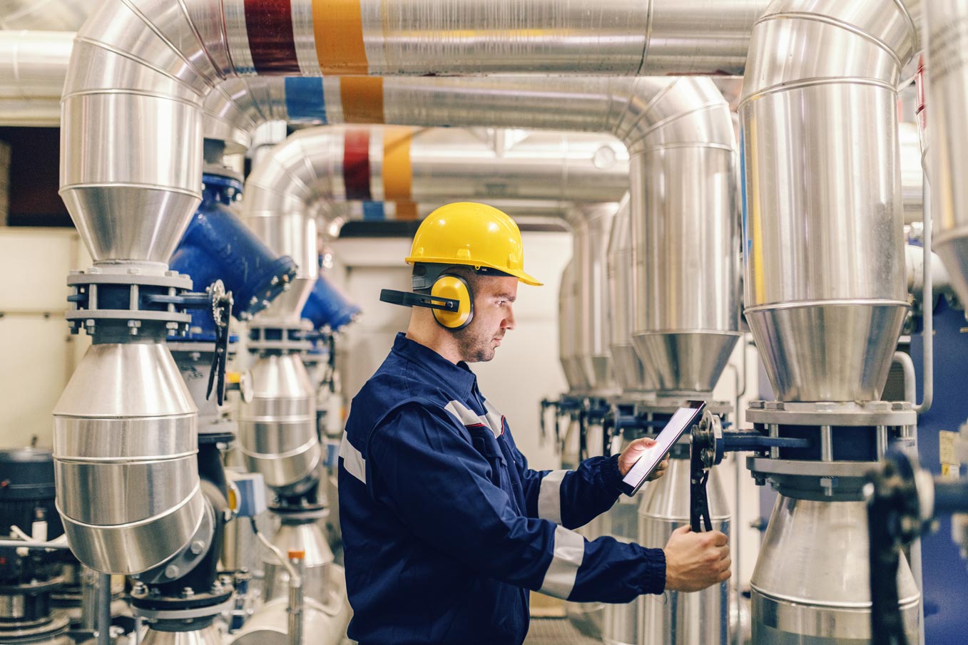 engineer working on a boiler